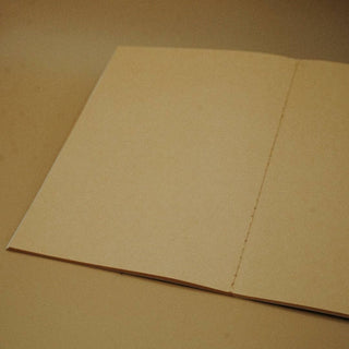 brown paper notebook​